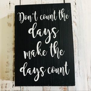 Wooden Sign with White Script quote